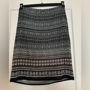 Max Studio elastic waist skirt. Lined. Black, white and bits of pink. Size L